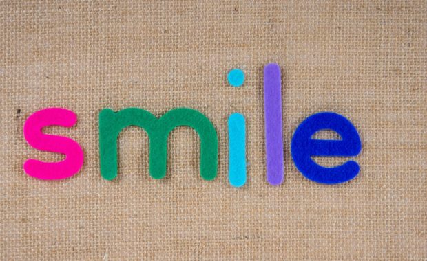 magnets spelling out the word smile